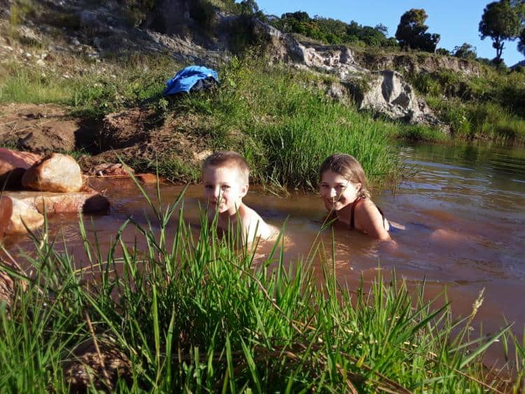 Abbey and Simeon are swimming