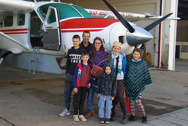 With the whole family next to the MAF plane